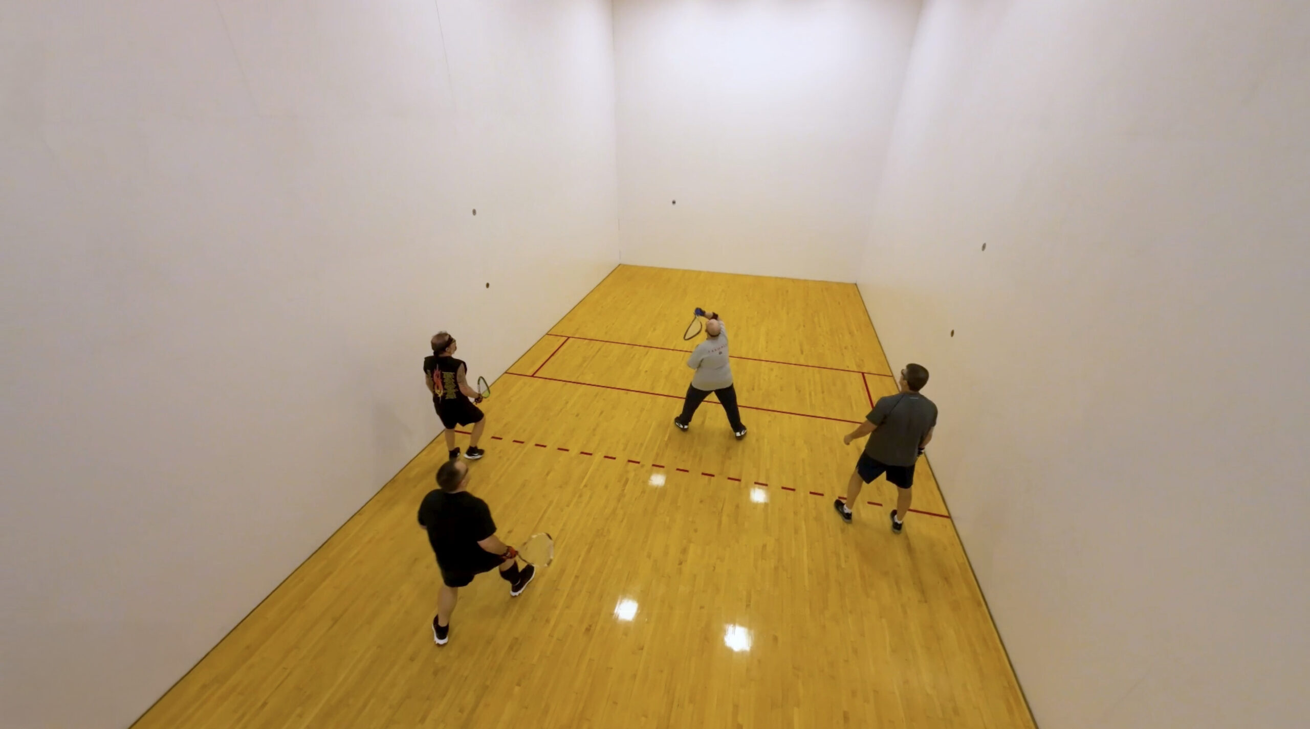 Men playing Racquetball